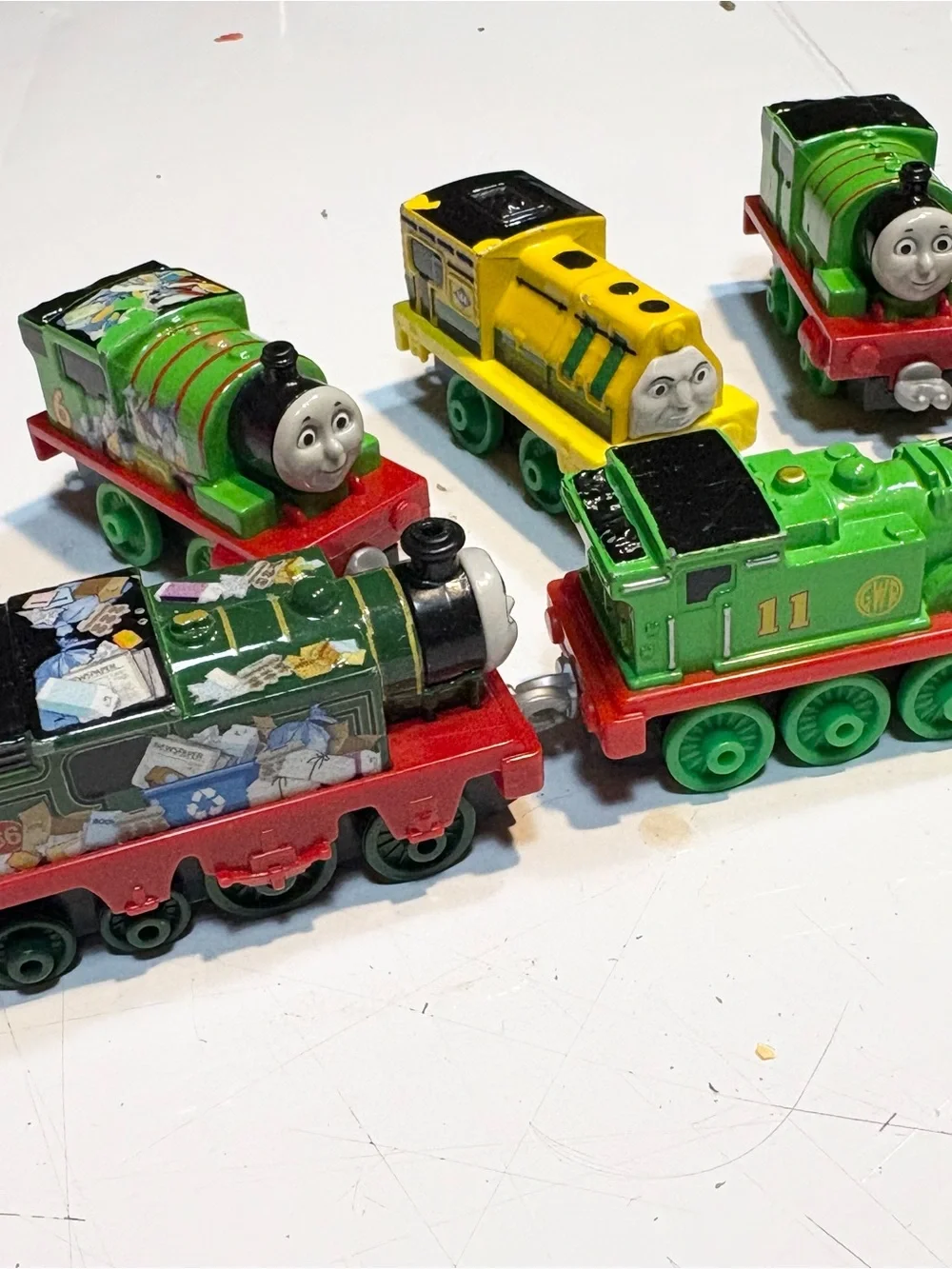 collection of die-cast train engines from the Thomas & Friends Take-n-Play